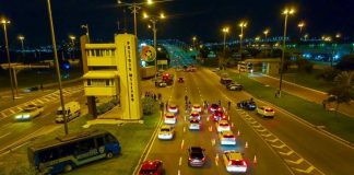 foto aérea da fila de carros em três faixas que levam para a ponte colombo salles