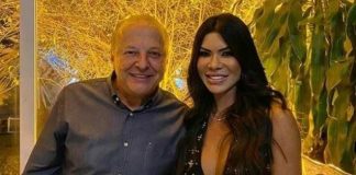 vice governador Otaviano Pivetta e aesposa viviana olham sorridentes para foto - ele é acusado de agredi-la em itapema